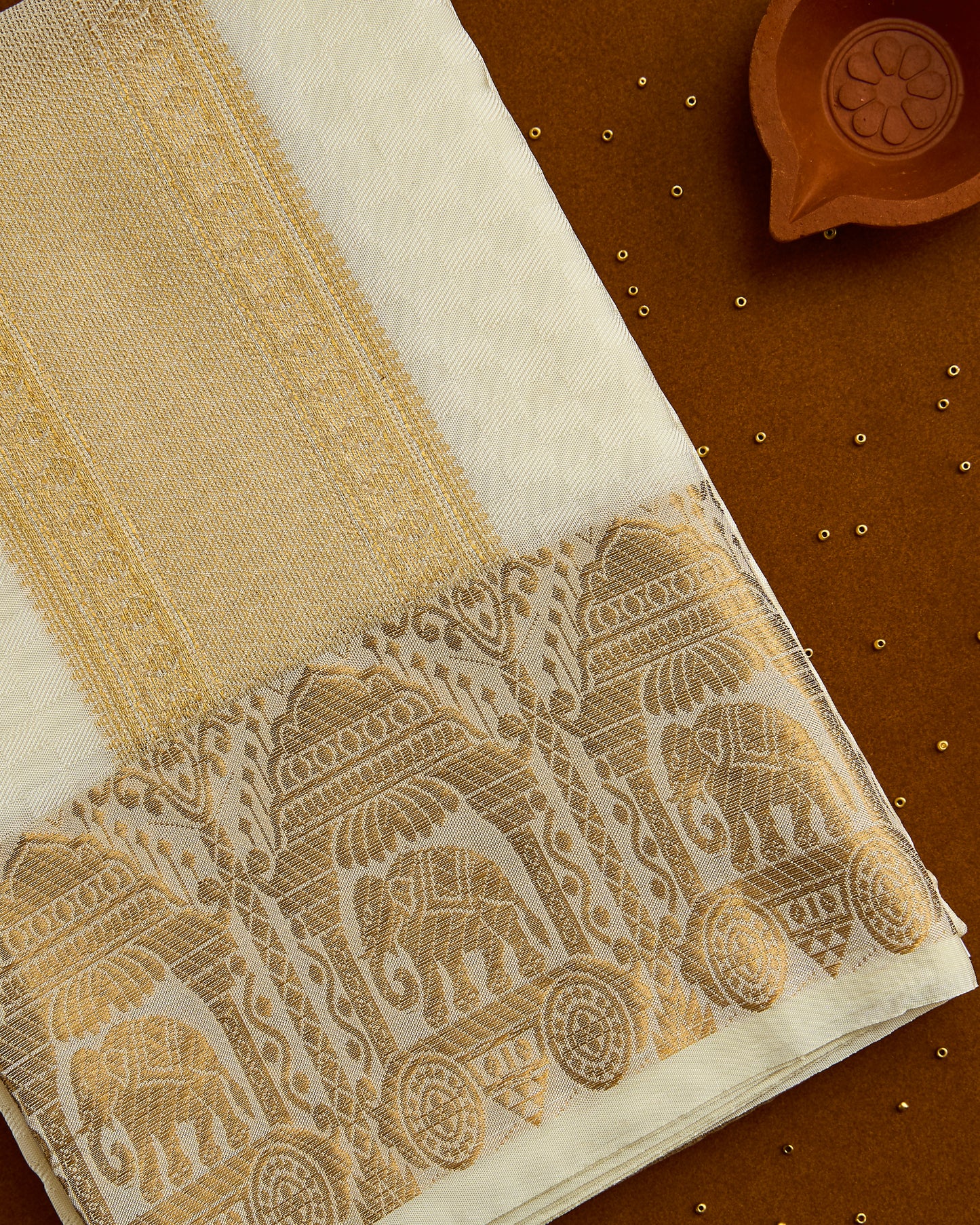 Semi Silk Elephant Border Embossed Dhoti set 8*4+2.50